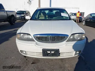2005 Lincoln LS w/Sport Pkg with VIN 1LNHM87A65Y667891, listed as a IAAI auction lot 41297490 with 118,633 mi miles. Bid and sale history available at carsss.com. Image 12.