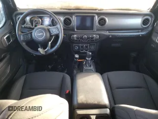 2023 Jeep Wrangler Sport S with VIN 1C4HJXDG3PW646818, listed as a Copart auction lot 77016834 with 12,118 mi miles and Clean Title. Bid and sale history available at DreamBid. Image 8.
