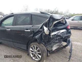 2014 Ford Escape SE z VIN 1FMCU9G94EUD64427, wystawiony jako IAAI lot #41965103 z przebiegiem 66 429 mil mil oraz . Historia ofert i sprzedaży dostępna na DreamBid. Obrazek 13.