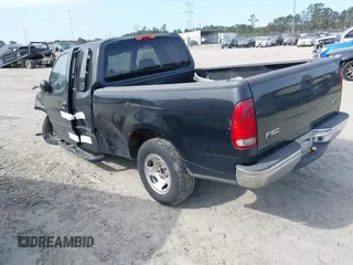 2003 Ford F-150 XL with VIN 1FTRX17W53NB19575, listed as a IAAI auction lot 41711599 with 1 mi miles. Bid and sale history available at carsss.com. Image 3.