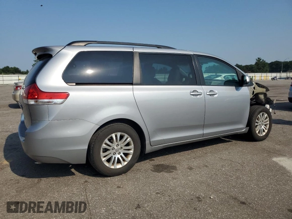2013 Toyota Sienna XLE AAS with VIN 5TDYK3DC0DS357281, listed as a Copart auction lot 61640645 with 69,262 mi miles and Salvage title. Bid and sale history available at DreamBid. Image 3.