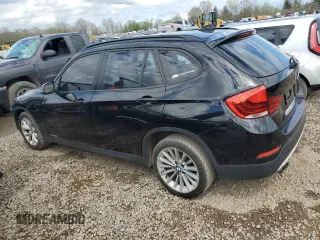 2013 BMW X1 xDrive28i z VIN WBAVL1C58DVR82070, wystawiony jako Copart lot #55740795 z przebiegiem 136 394 mil mil oraz Nie do naprawy • Non repairable. Historia ofert i sprzedaży dostępna na DreamBid. Obrazek 2.