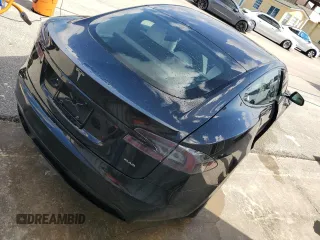 2022 Tesla Model S Plaid z VIN 5YJSA1E64NF461218, wystawiony jako Copart lot #74178794 z przebiegiem Nie podano mil oraz Szkoda całkowita • Salvage title. Historia ofert i sprzedaży dostępna na DreamBid. Obrazek 3.