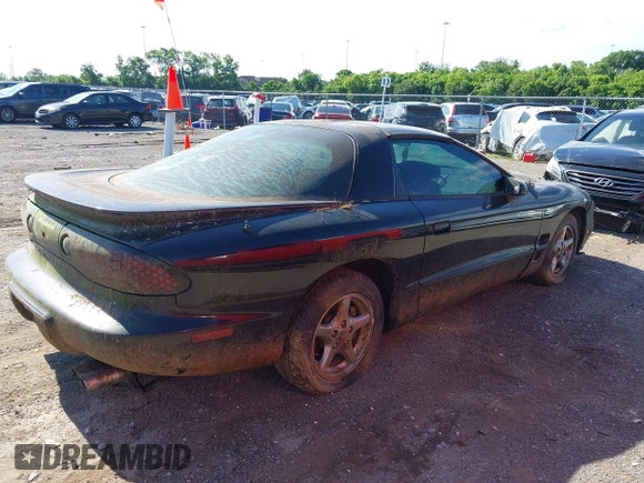 2001 Pontiac Firebird Formula z VIN 2G2FV22G512149316, wystawiony jako IAAI lot #42322668 z przebiegiem 109 585 mil mil oraz . Historia ofert i sprzedaży dostępna na DreamBid. Obrazek 4.