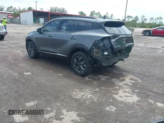 2023 Kia Sportage SX-Prestige with VIN KNDPXCAG7P7071365, listed as a IAAI auction lot 42247639 with 21,509 mi miles and . Bid and sale history available at DreamBid. Image 3.