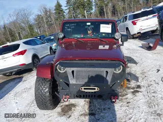 2008 Jeep Wrangler Unlimited Sahara with VIN 1J8GA59198L510502, listed as a IAAI auction lot 41095844 with 161,907 mi miles. Bid and sale history available at carsss.com. Image 12.