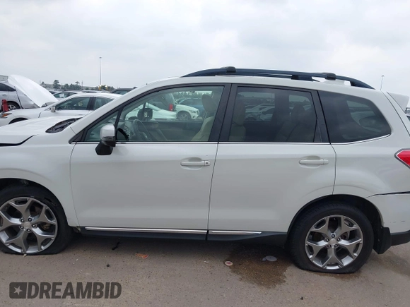 2016 Subaru Forester Touring z VIN JF2SJAVC2GH465083, wystawiony jako IAAI lot #42287323 z przebiegiem Nie podano mil oraz . Historia ofert i sprzedaży dostępna na DreamBid. Obrazek 14.