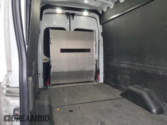 2023 Ford Transit Cargo z VIN 1FTBR3X88PKB88910, wystawiony jako Copart lot #46260995 z przebiegiem 64 307 mil mil oraz Szkoda całkowita • Salvage title. Historia ofert i sprzedaży dostępna na DreamBid. Obrazek 10.