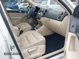 2010 Volkswagen Tiguan with VIN WVGBV9AX2AW513478, listed as a IAAI auction lot 42607466 with 63,780 mi miles and . Bid and sale history available at DreamBid. Image 5.