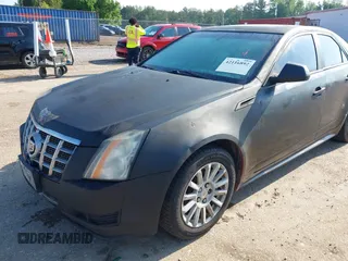 2012 Cadillac CTS z VIN 1G6DA5E51C0152943, wystawiony jako IAAI lot #42116892 z przebiegiem 176 049 mil mil oraz . Historia ofert i sprzedaży dostępna na DreamBid. Obrazek 6.