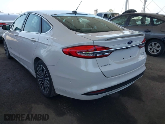 2017 Ford Fusion Hybrid Titanium with VIN 3FA6P0RU8HR229653, listed as a IAAI auction lot 42445182 with 163,279 mi miles and . Bid and sale history available at DreamBid. Image 3.