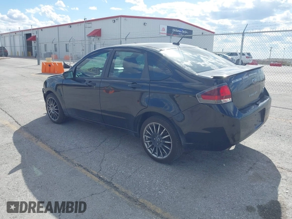 2010 Ford Focus SES with VIN 1FAHP3GN7AW291389, listed as a IAAI auction lot 42003153 with 151,987 mi miles. Bid and sale history available at carsss.com. Image 3.