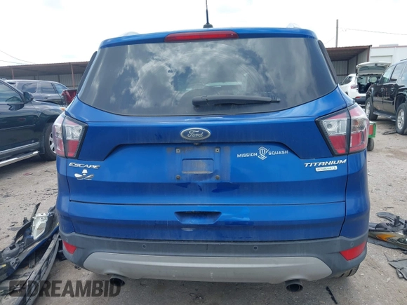2017 Ford Escape Titanium with VIN 1FMCU0JD3HUE35131, listed as a IAAI auction lot 42062019 with 108,470 mi miles and . Bid and sale history available at DreamBid. Image 17.