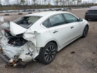 2018 Nissan Altima SR with VIN 1N4AL3AP7JC174856, listed as a IAAI auction lot 42070366 with 135,680 mi miles and . Bid and sale history available at carsss.com. Image 4.