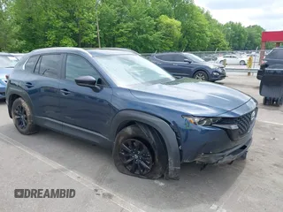 2023 Mazda CX-50 S Preferred Plus z VIN 7MMVABCM4PN119583, wystawiony jako IAAI lot #42108949 z przebiegiem 26 254 mil mil oraz . Historia ofert i sprzedaży dostępna na DreamBid. Obrazek 1.
