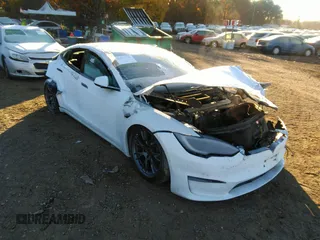 2022 Tesla Model S with VIN 5YJSA1E54NF488023, listed as a IAAI auction lot 36074023 with 200 mi miles and . Bid and sale history available at DreamBid. Image 1.