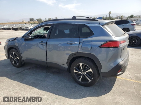 2024 Toyota Corolla Cross Hybrid S with VIN 7MUFBABG7RV043044, listed as a Copart auction lot 61828715 with 10,473 mi miles and Salvage title. Bid and sale history available at DreamBid. Image 2.