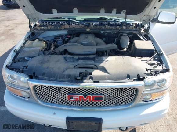 2004 GMC Yukon Denali with VIN 1GKEK63U54J251781, listed as a IAAI auction lot 42099768 with 166,543 mi miles. Bid and sale history available at carsss.com. Image 10.