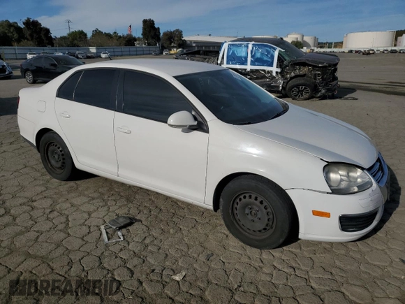2010 Volkswagen Jetta Sedan S with VIN 3VWJZ7AJ2AM049092, listed as a Copart auction lot 52806955 with 251,408 mi miles and Salvage Title. Bid and sale history available at carsss.com. Image 4.