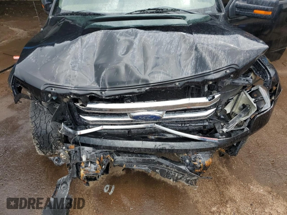 2013 Ford F-150 XL with VIN 1FTFW1EF8DFA21791, listed as a Copart auction lot 61963215 with 128,161 mi miles and Salvage title. Bid and sale history available at DreamBid. Image 11.