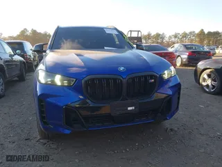 2025 BMW X5 M60i with VIN 5UX33EU04S9W34632, listed as a IAAI auction lot 41274184 with 5,943 mi miles. Bid and sale history available at carsss.com. Image 12.