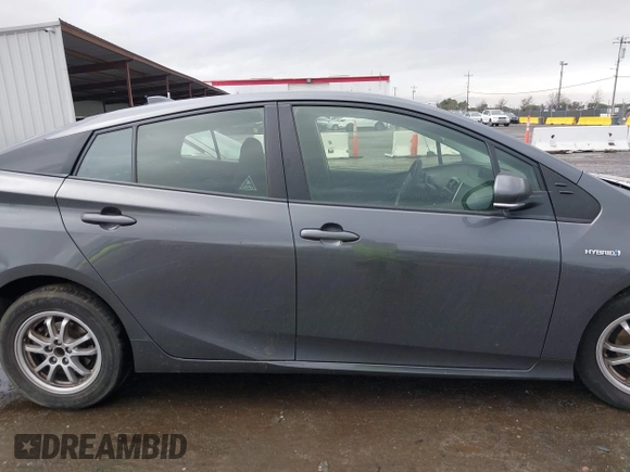 2021 Toyota Prius L Eco with VIN JTDKAMFUXM3143646, listed as a IAAI auction lot 41507110 with 207,238 mi miles. Bid and sale history available at carsss.com. Image 13.