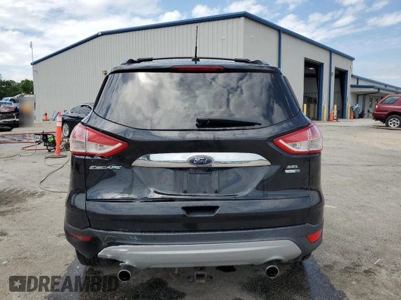 2013 Ford Escape SEL with VIN 1FMCU9HX0DUD23563, listed as a Copart auction lot 58691535 with 170,031 mi miles and Salvage title. Bid and sale history available at DreamBid. Image 6.