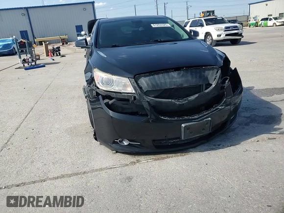 2012 Buick LaCrosse Touring z VIN 1G4GJ5E30CF227634, wystawiony jako Copart lot #61255525 z przebiegiem 133 759 mil mil oraz Szkoda całkowita • Salvage title. Historia ofert i sprzedaży dostępna na DreamBid. Obrazek 14.