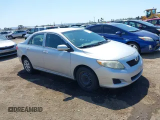 2010 Toyota Corolla with VIN 1NXBU4EE1AZ319230, listed as a IAAI auction lot 41988978 with 238,497 mi miles. Bid and sale history available at carsss.com. Image 1.