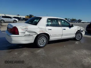 2003 Mercury Grand Marquis GS Convenience z VIN 2MEFM74W13X607924, wystawiony jako Copart lot #48960815 z przebiegiem 141 975 mil mil oraz Szkody całkowita. Historia ofert i sprzedaży dostępna na DreamBid. Obrazek 3.
