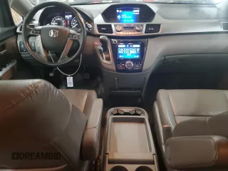 2015 Honda Odyssey EX-L with VIN 5FNRL5H62FB014772, listed as a Copart auction lot 55088925 with 144,152 mi miles and Salvage Title. Bid and sale history available at DreamBid. Image 8.