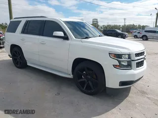 2017 Chevrolet Tahoe LS with VIN 1GNSCAKC9HR281906, listed as a IAAI auction lot 41277058 with 177,980 mi miles. Bid and sale history available at carsss.com. Image 1.