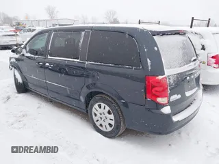 2013 Dodge Grand Caravan SE with VIN 2C4RDGBGXDR746630, listed as a IAAI auction lot 41239381 with 213,421 mi miles and . Bid and sale history available at DreamBid. Image 3.