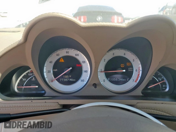 2009 Mercedes-Benz SL 550 with VIN WDBSK71F69F147589, listed as a Copart auction lot 65976995 with 77,387 mi miles and Salvage title. Bid and sale history available at DreamBid. Image 9.