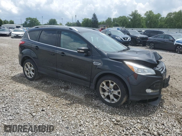2015 Ford Escape Titanium with VIN 1FMCU9J91FUA38787, listed as a Copart auction lot 59749735 with 132,536 mi miles and Salvage title. Bid and sale history available at DreamBid. Image 4.