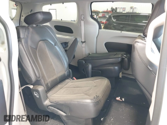 2022 Chrysler Pacifica Touring L with VIN 2C4RC1BGXNR144831, listed as a IAAI auction lot 40473026 with 36,495 mi miles and . Bid and sale history available at DreamBid. Image 8.