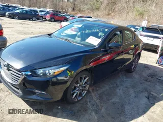 2018 Mazda 3 Touring with VIN 3MZBN1V34JM208669, listed as a IAAI auction lot 41834164 with 117,639 mi miles. Bid and sale history available at carsss.com. Image 17.