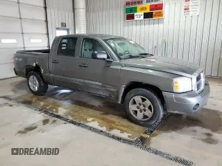 2005 Dodge Dakota SLT z VIN 1D7HW48N95S166589, wystawiony jako Copart lot #54868565 z przebiegiem 228 682 mil mil oraz Szkoda całkowita • Salvage title. Historia ofert i sprzedaży dostępna na DreamBid. Obrazek 4.