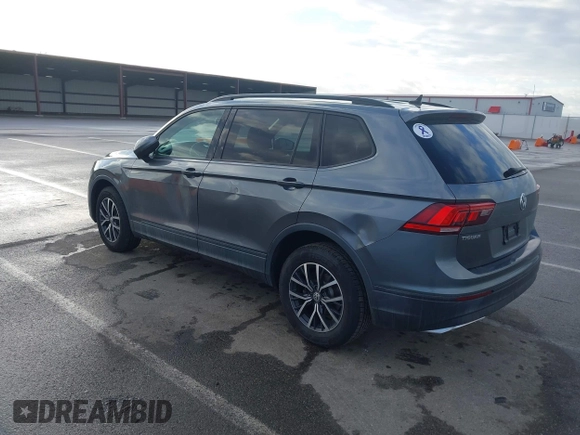 2021 Volkswagen Tiguan S with VIN 3VV1B7AX8MM016874, listed as a IAAI auction lot 41633090 with 76,857 mi miles and . Bid and sale history available at DreamBid. Image 3.