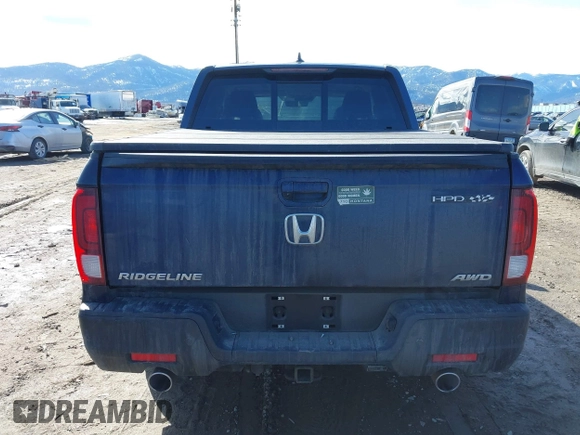 2022 Honda Ridgeline RTL-E with VIN 5FPYK3F71NB013522, listed as a IAAI auction lot 41670347 with 24,689 mi miles and . Bid and sale history available at DreamBid. Image 16.