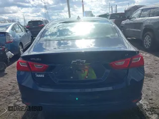 2018 Chevrolet Malibu LT z VIN 1G1ZD5ST7JF214362, wystawiony jako IAAI lot #41676417 z przebiegiem 73 908 mil mil oraz . Historia ofert i sprzedaży dostępna na DreamBid. Obrazek 16.