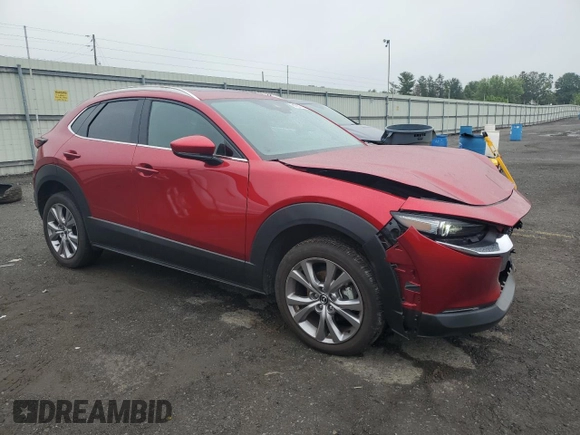 2021 Mazda CX-30 Premium with VIN 3MVDMBDL5MM212318, listed as a Copart auction lot 61057745 with 52,304 mi miles and Salvage title. Bid and sale history available at DreamBid. Image 4.