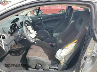 2009 Mitsubishi Eclipse GS with VIN 4A3AK24F49E029698, listed as a Copart auction lot 73087504 with 87,284 mi miles and Salvage Title. Bid and sale history available at carsss.com. Image 7.