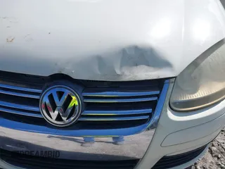 2007 Volkswagen Jetta Wolfsburg Edition z VIN 3VWEF71K77M077224, wystawiony jako IAAI lot #41762803 z przebiegiem Nie podano mil oraz . Historia ofert i sprzedaży dostępna na DreamBid. Obrazek 6.