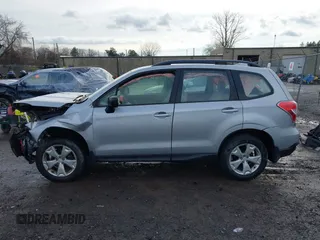 2016 Subaru Forester 2.5i with VIN JF2SJABCXGH476790, listed as a IAAI auction lot 41950043 with 87,352 mi miles and . Bid and sale history available at DreamBid. Image 14.