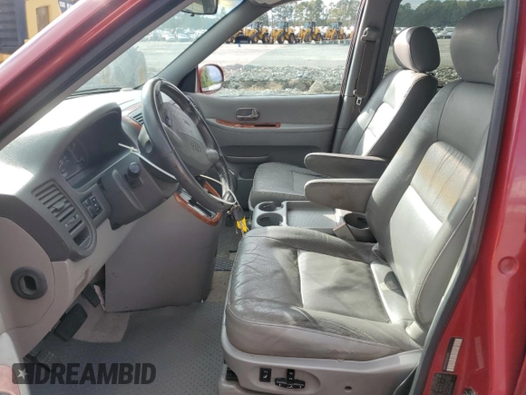 2005 Kia Sedona LX with VIN KNDUP131056614364, listed as a Copart auction lot 73935454 with 149,420 mi miles and Salvage Title. Bid and sale history available at carsss.com. Image 7.
