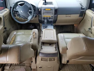 2006 Nissan Armada LE z VIN 5N1AA08A86N734102, wystawiony jako Copart lot #42944385 z przebiegiem 241 609 mil mil oraz Szkoda całkowita • Salvage title. Historia ofert i sprzedaży dostępna na DreamBid. Obrazek 8.