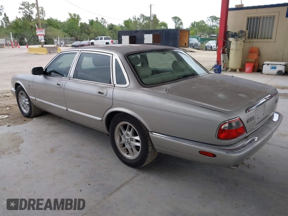 1999 Jaguar XJ with VIN SAJHX1043XC856474, listed as a IAAI auction lot 41626649 with 103,266 mi miles and . Bid and sale history available at DreamBid. Image 3.