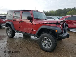 2013 Jeep Wrangler Unlimited Rubicon with VIN 1C4HJWFG6DL565462, listed as a Copart auction lot 51333785 with 113,601 mi miles and Salvage title. Bid and sale history available at DreamBid. Image 4.