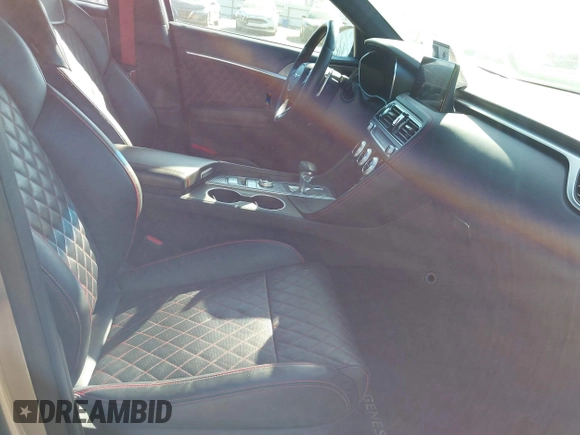 2022 Genesis G70 3.3T z VIN KMTG54TE0NU084191, wystawiony jako IAAI lot #41479649 z przebiegiem 51 548 mil mil oraz . Historia ofert i sprzedaży dostępna na DreamBid. Obrazek 5.